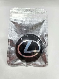 Наклейка на колпаки Lexus сферическая изогнутая 5,4см 4шт черная (226762)
