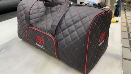 Дорожная сумка из экокожи с лого