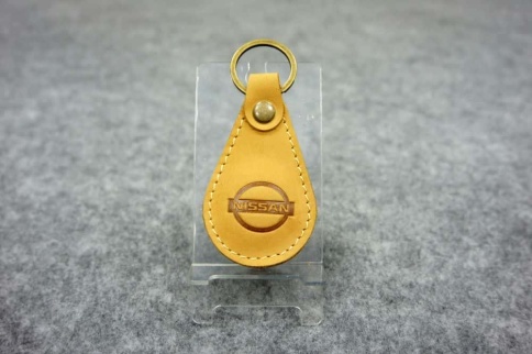 Брелок  на ключ Nissan кожа   фото 1